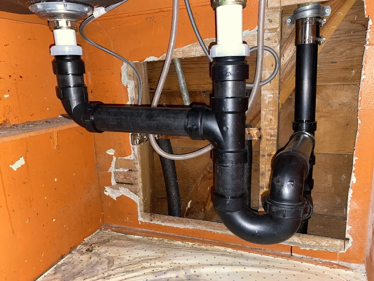 Professional Garbage Disposal Repair equipment and tools on the job in Wedgefield